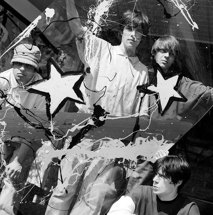 Kevin Cummins photograph Ian Brown, John Squire, Gart "Mani" Mountfield and Alan "Remi" Wren.of The Stone Roses members Ian Brown, John Squire, Gart "Mani" Mountfield and Alan "Remi" Wren